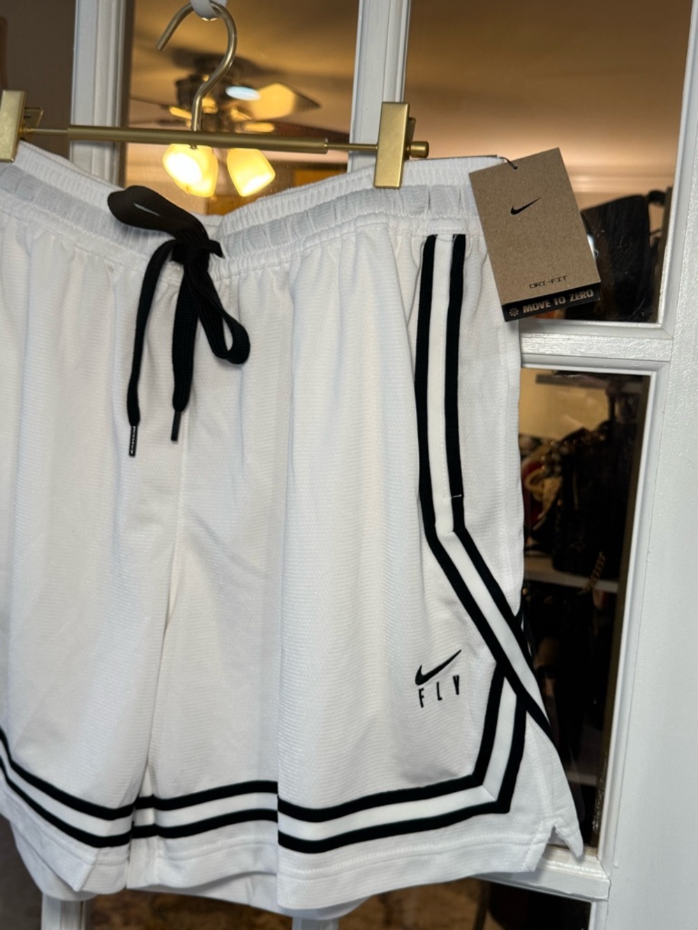 Nike Women’s White Athletic Shorts with Black Accents - Picture 3 of 4